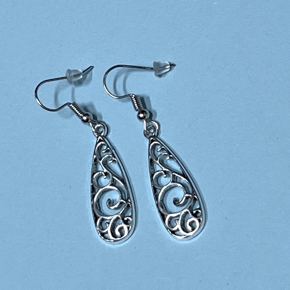 Ornate silver dangle earrings